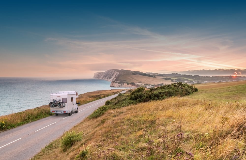 Motorhome driving along a scenic road
