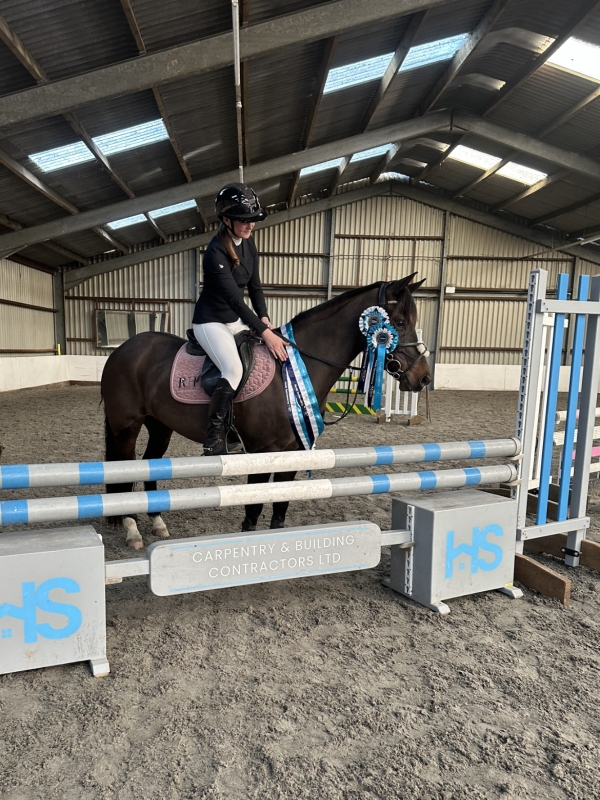 Rubi jumping in a show