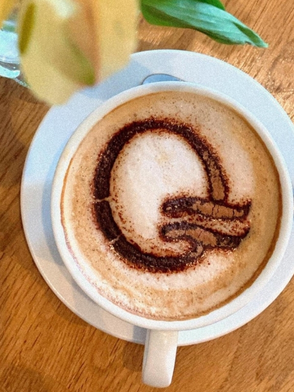 coffee with quay arts logo in chocolate